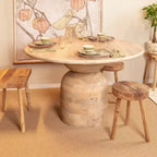 Table à manger en bois de manguier naturel : Finition blanchie, pied central, diamètre 119 cm