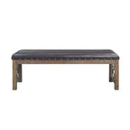 Bancs et poufs Raphaela 56" en similicuir noir et finition merisier vieilli : bordure cloutée, pieds en métal